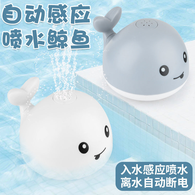 Electric sensor water spray whale baby toys with lights and music universal play water toys